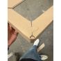 Cardboard edgeboard with puzzle type cut