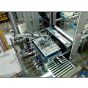 Applicator of flat carton between load's interlayers